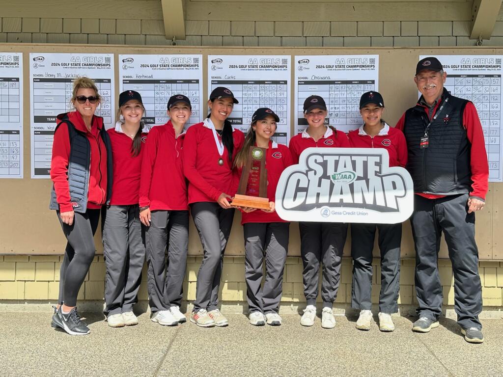 Members of the Camas girls golf team poses after winning the team title at the Class 4A state championship at The Creek at Qualchan Golf Course in Spokane on Wednesday, May 22, 2024.