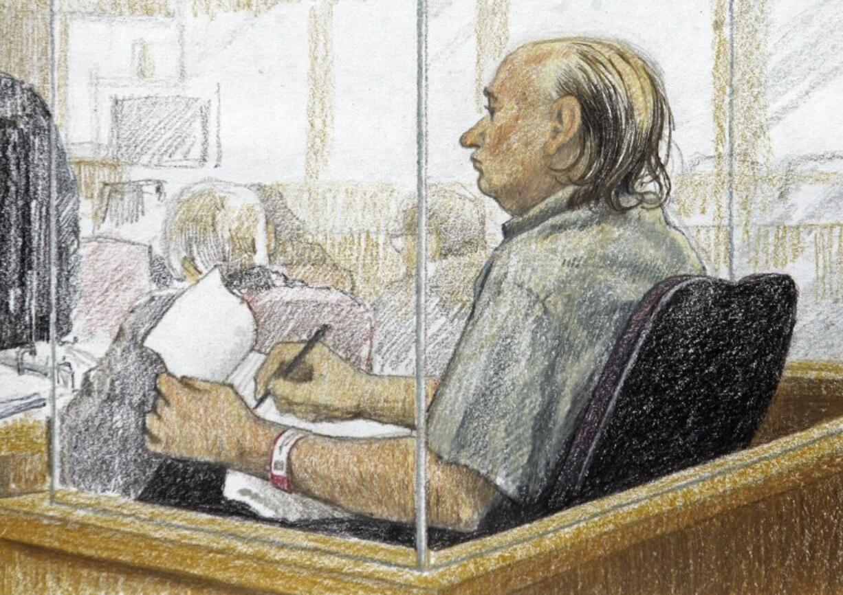 This artist&rsquo;s sketch shows accused serial killer Robert Pickton taking notes during the second day of his trial in B.C. Supreme Court in New Westminster, British Columbia, Jan. 31, 2006. Convicted Canadian serial killer Pickton has been hospitalized and is in a life-threatening condition after an assault at a Quebec prison, authorities said Tuesday, May 21, 2024.