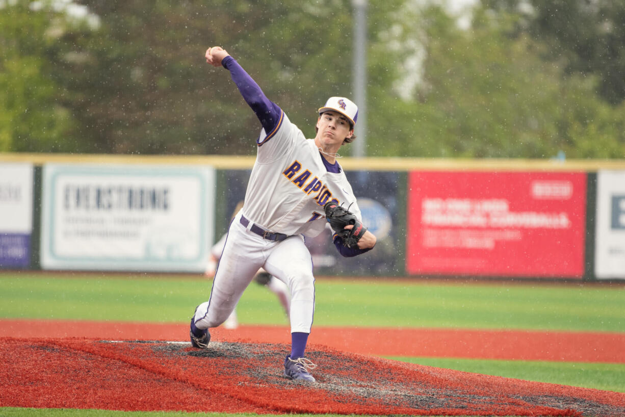 Columbia River's Zach Ziebell delivers a pitch against Lynden in the Class 2A baseball semifinals on Friday, May 24, 2024 in Bellingham.