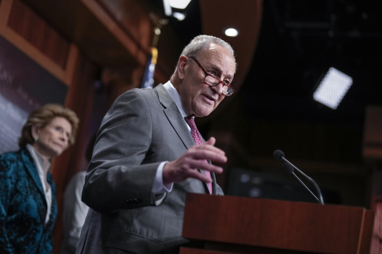 Senate Majority Leader Chuck Schumer, D-N.Y., joined at left by Sen. Debbie Stabenow, D-Mich., speaks to reporters after Senate Republicans blocked a bipartisan border security and immigration bill for a second time this year, at the Capitol in Washington, Thursday, May 23, 2024. (AP Photo/J.