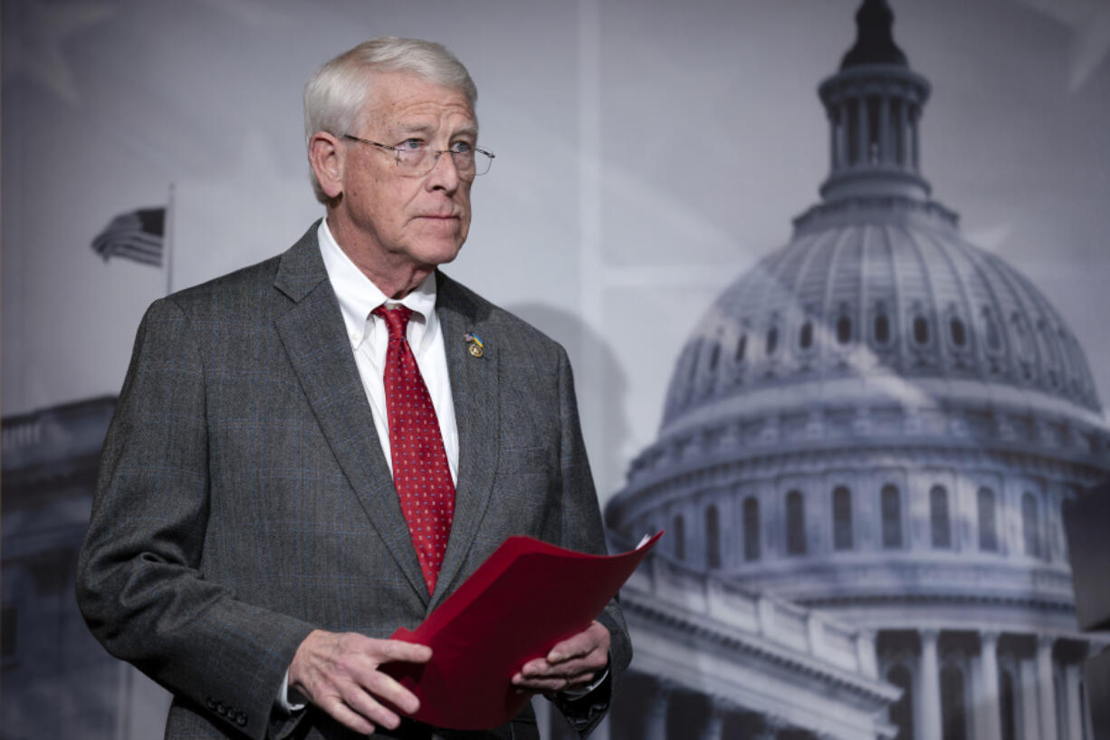 FILE - Senate Armed Services Committee Ranking Member Roger Wicker, R-Miss., meets with reporters during a news conference at the Capitol in Washington, Jan. 11, 2024. The top Republican on a Senate committee that oversees the U.S. military is making an argument for aggressively increasing defense spending over negotiated spending caps. Sen. Roger Wicker, a Mississippi Republican, is releasing a plan for a &ldquo;generational investment&rdquo; that seeks to deter coordinated threats from U.S. adversaries like Russia, Iran and China. (AP Photo/J.