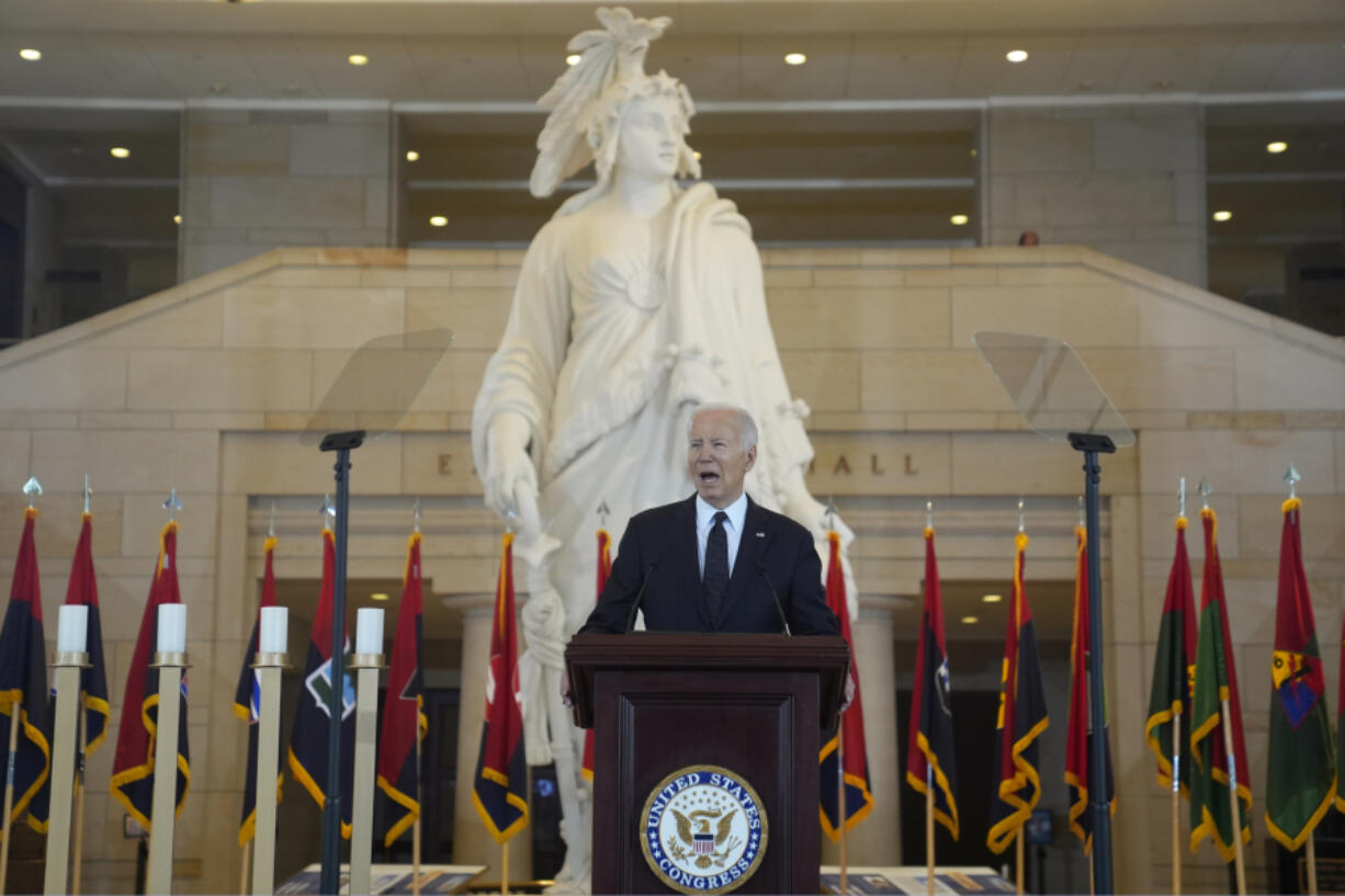 President Joe Biden speaks at the U.S. Holocaust Memorial Museum&#039;s Annual Days of Remembrance ceremony at the U.S. Capitol, Tuesday, May 7, 2024 in Washington.  Statue of Freedom stands behind.