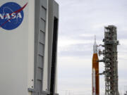 FILE - The NASA moon rocket rolls back to the Vehicle Assembly Building at the Kennedy Space Center Sept. 27, 2022, in Cape Canaveral, Fla. In Washington, a city that revolves around the federal government, the annual Best Places to Work survey is a closely-watched annual event worthy of bragging rights, provided you&rsquo;re one of the agencies like NASA or the Government Accountability Office who topped the survey. The survey, released Monday, May 20, 2024, uses information from the Office of Personnel Management&rsquo;s Federal Employee Viewpoint Survey.