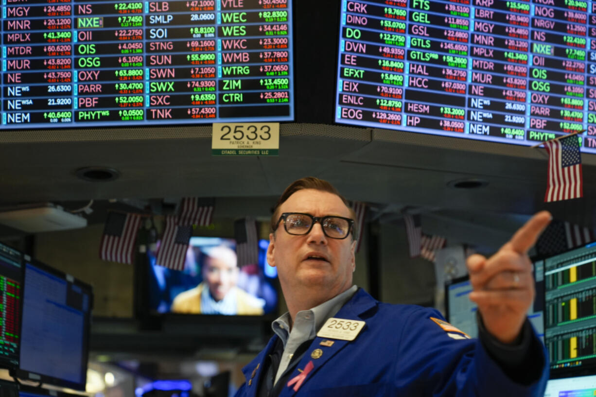 Traders work on the floor at the New York Stock Exchange in New York, Wednesday, May 1, 2024.