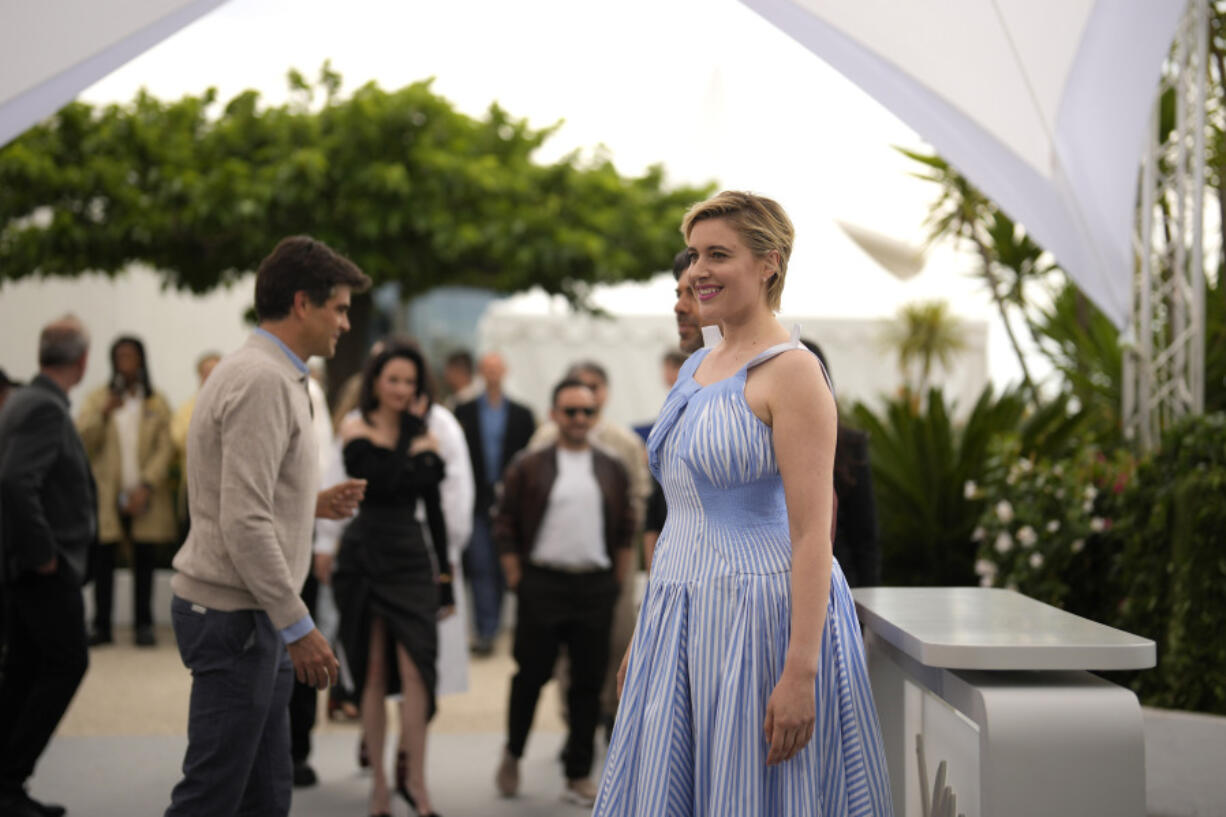 Jury president Greta Gerwig poses for photographers during the jury photo call at the 77th international film festival, Cannes, southern France, Tuesday, May 14, 2024.