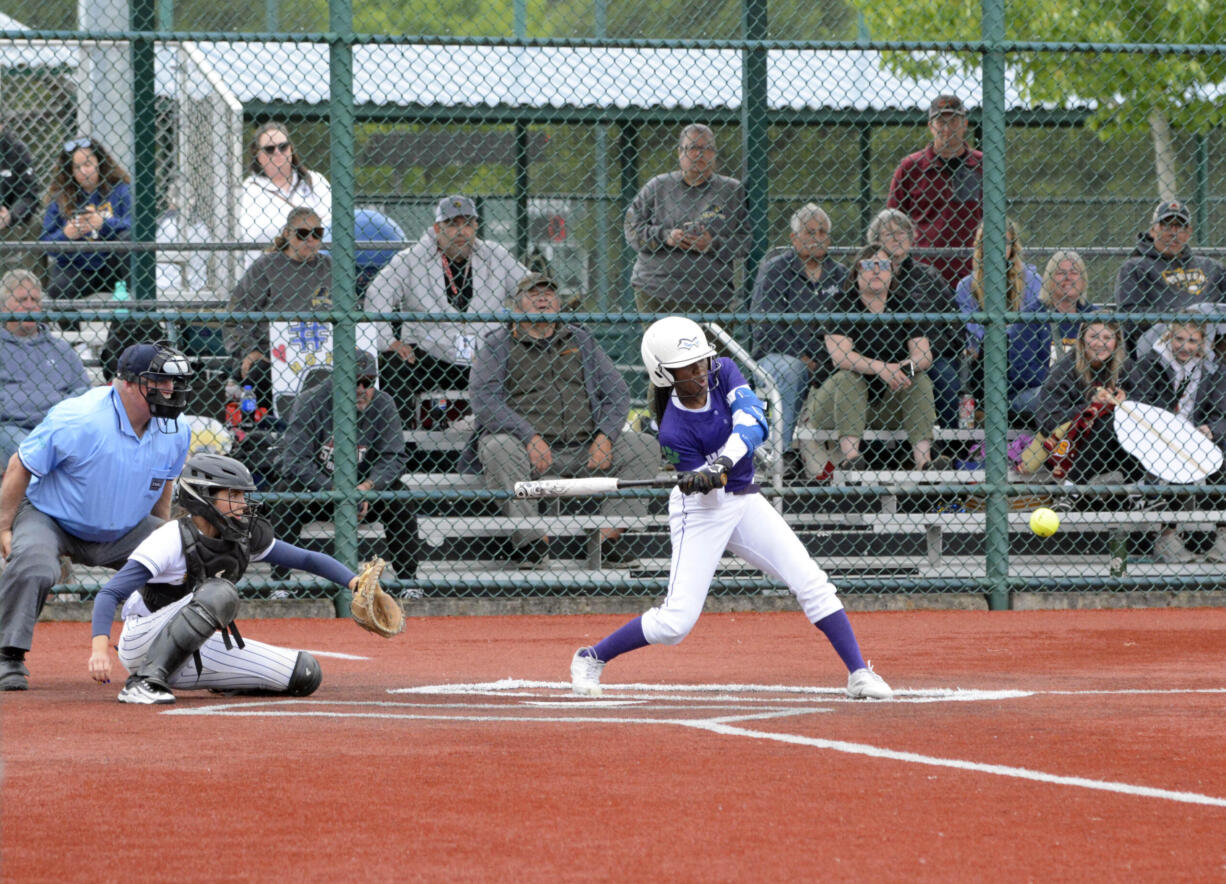 Heritage's Jaila Ellis connects on a pitch for an RBI base hit during a Class 3A state softball opening round game against Mead on Thursday, May 23, 2024, at Regional Athletic Complex in Lacey.