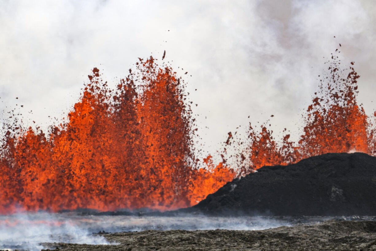 A volcano spews lava in Grindavik, Iceland, Wednesday, May 29, 2024. A volcano in southwestern Iceland is erupting, spewing red streams of lava in its latest display of nature&rsquo;s power. A series of earthquakes before the eruption Wednesday triggered the evacuation of the popular Blue Lagoon geothermal spa. The eruption began in the early afternoon north of Grindavik, a coastal town of 3,800 people that was also evacuated.