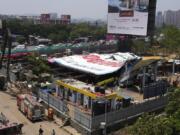 A general view of a large billboard that collapsed Monday evening following heavy rain and thundershowers at Ghatkopar, a suburb of Mumbai, India, Tuesday, May 14, 2024. More than a dozen people were killed and dozens more were injured in the accident.