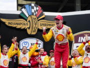 Josef Newgarden celebrates after winning the Indianapolis 500 auto race at Indianapolis Motor Speedway in Indianapolis, Sunday, May 26, 2024.