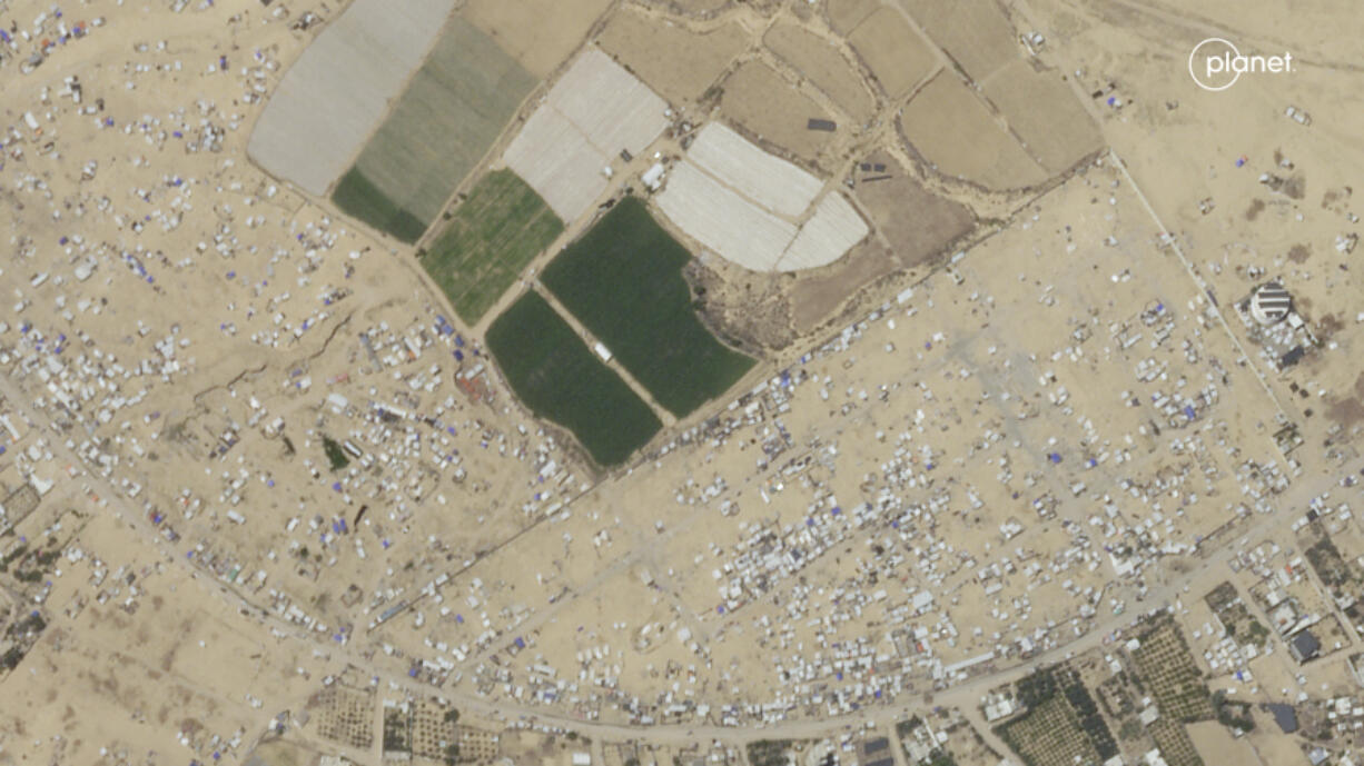 This satellite photo taken by Planet Labs PBC shows an evacuated camp in Rafah, Gaza, May 8, 2024.