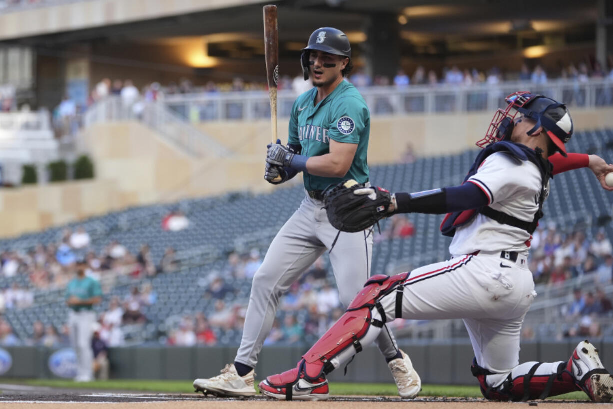 Seattle Mariners&#039; Josh Rojas reacts after striking out during the first inning of a baseball game against the Minnesota Twins, Wednesday, May 8, 2024, in Minneapolis.