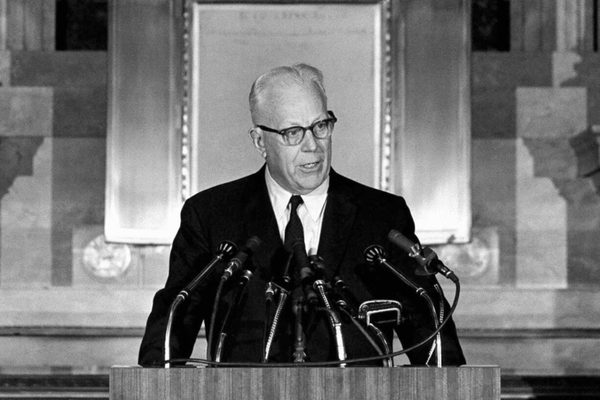 FILE - Chief Justice Earl Warren speaks at the Washington National Archives during a ceremony marking the 175th anniversary of congressional passage of legislation establishing the federal judicial system in the U.S., on Sept. 22, 1964. Seventy years ago, no one outside of the U.S. Supreme Court building heard it when Warren announced the historic Brown vs. Board of Education decision on school desegregation. Now, through the use of a voice-cloning technology, it is becoming possible for people to &ldquo;hear&rdquo; Warren read the decision as he did on May 17, 1954, along with oral arguments by lawyers.