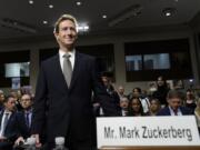 FILE - Meta CEO Mark Zuckerberg arrives to testify before a Senate Judiciary Committee hearing on Capitol Hill in Washington, Wednesday, Jan. 31, 2024.