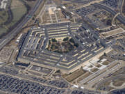 FILE - The Pentagon is seen from Air Force One as it flies over Washington, March 2, 2022.