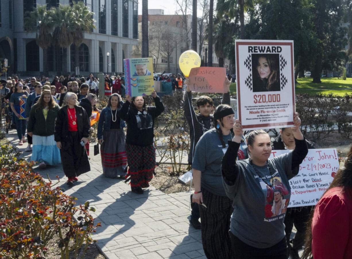 FILE - Family and friends of the missing and murdered march around the California State Capitol at the second annual Missing and Murdered Indigenous People Summit and Day of Action, Tuesday, Feb. 13, 2024, in Sacramento, Calif. Sunday, May 5, marks Missing and Murdered Indigenous Persons Awareness Day.