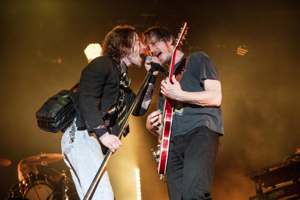 Matt Shultz, left, and Nick Bockrath of Cage The Elephant perform Sept. 4, 2022, at the All In Music &amp; Arts Festival in Indianapolis.
