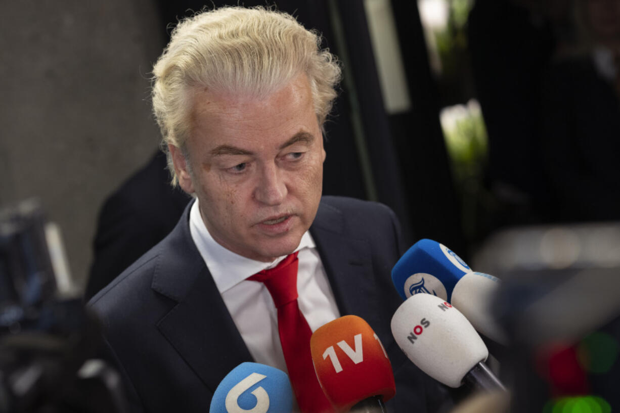 FILE - Geert Wilders, leader of the far-right party PVV, or Party for Freedom, talks to the media, two days after winning the most votes in a general election, in The Hague, Netherlands, on Nov. 24, 2023. Anti-Islam firebrand Geert Wilders is on the verge of brokering a four-party coalition in the Netherlands six months after coming in first in national elections, opening the prospect that yet another European Union nation will veer toward the hard right weeks ahead of EU-wide elections.