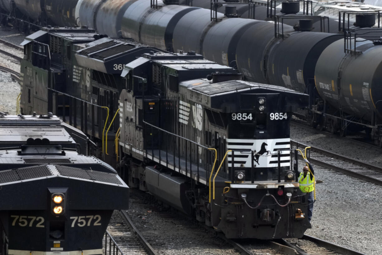 FILE - Norfolk Southern locomotives are moved through the Conway Terminal in Conway, Pa., June 17, 2023. Norfolk Southern shareholders will decide Thursday, May 9, 2024, whether to back an activist investor&rsquo;s bid to take over the railroad&rsquo;s board and replace management. (AP Photo/Gene J.