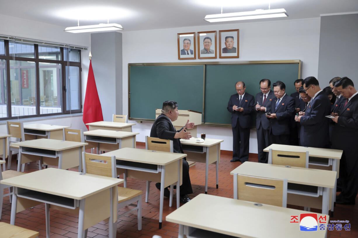 In this photo provided by the North Korean government, North Korean leader Kim Jong Un, left, inspects a class room of a newly built central cadres training school in Pyongyang, North Korea, Tuesday, May 21, 2024. Independent journalists were not given access to cover the event depicted in this image distributed by the North Korean government. The content of this image is as provided and cannot be independently verified. Korean language watermark on image as provided by source reads: &ldquo;KCNA&rdquo; which is the abbreviation for Korean Central News Agency.