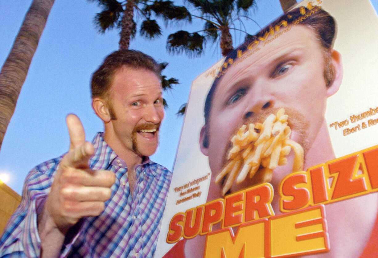 FILE - Morgan Spurlock poses at the Los Angeles premiere of his film &ldquo;Super Size Me,&rdquo; Thursday night, April 22, 2004, in the Hollywood section of Los Angeles. Spurlock, an Oscar-nominee who made food and American diets his life&rsquo;s work, famously eating only at McDonald&rsquo;s for a month to illustrate the dangers of a fast-food diet, has died. He was 53. (AP Photo/Mark J.