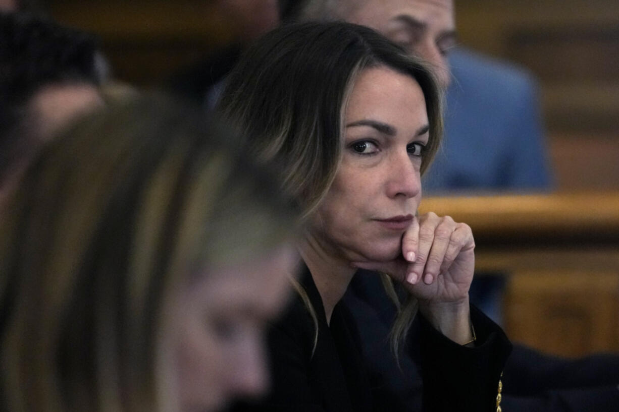 Karen Read listens to testimony during her trial at Norfolk County Superior Court, Friday, May 17, 2024, in Dedham, Mass. Read, 44, is accused of running into her Boston police officer boyfriend with her SUV in the middle of a nor&rsquo;easter and leaving him for dead after a night of heavy drinking.