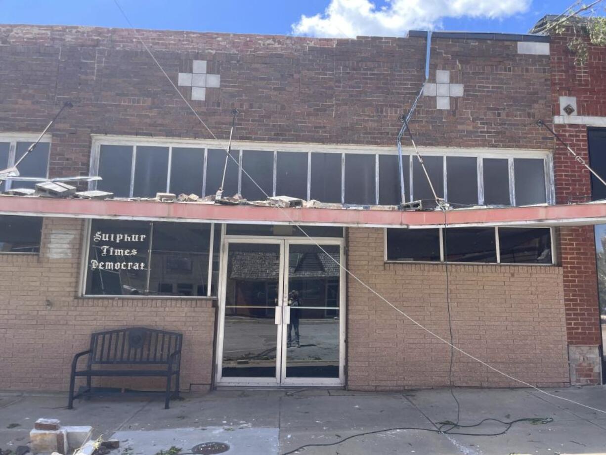 Damage surrounds the Sulphur Times-Democrat building on Monday, April 29, 2024, after a tornado plowed through the rural Oklahoma community and left wide destruction through downtown Sulphur, Oka.