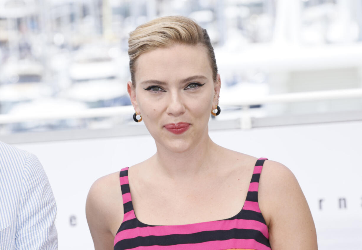 FILE - Scarlett Johansson poses for photographers at the photo call for the film &ldquo;Asteroid City&rdquo; at the 76th international film festival, Cannes, southern France, May 24, 2023.