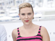 FILE - Scarlett Johansson poses for photographers at the photo call for the film &ldquo;Asteroid City&rdquo; at the 76th international film festival, Cannes, southern France, May 24, 2023.