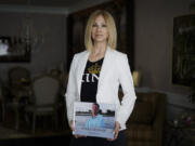 Suzanne Harrison, who runs King&#039;s Crusade in honor of her brother who died of an overdose in 2016 poses for a photograph in Evesham, N.J., Tuesday, April 2, 2024. Harrison says the charity could use funding from national opioid settlements to help people if local governments made it available to groups like hers.