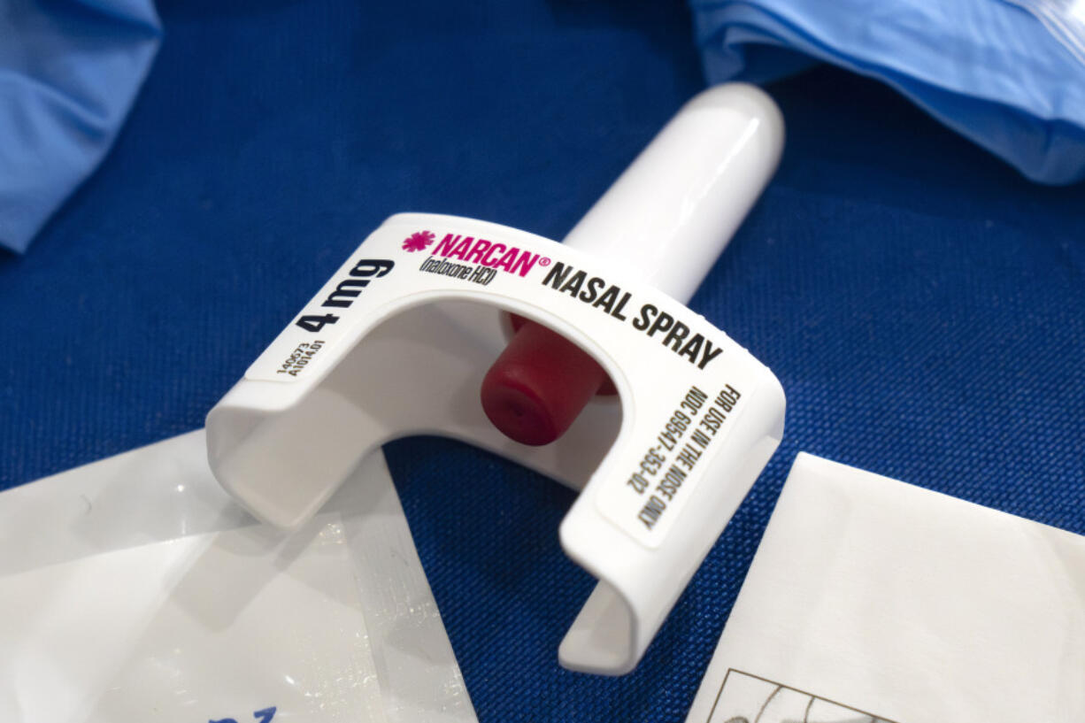 FILE - A container of Narcan, a brand name version of the opioid overdose-reversal drug naloxone, sits on a table following a demonstration at the Health and Human Services Humphrey Building on Friday, Sept. 8, 2023, in Washington. The number of U.S. fatal overdoses fell in 2023 &mdash; for only the second time since the current national epidemic of drug deaths began more than three decades ago. The Centers for Disease Control and Prevention posted the numbers on Wednesday, May 15, 2024.