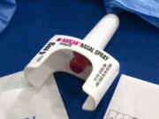 FILE - A container of Narcan, a brand name version of the opioid overdose-reversal drug naloxone, sits on a table following a demonstration at the Health and Human Services Humphrey Building on Friday, Sept. 8, 2023, in Washington. The number of U.S. fatal overdoses fell in 2023 &mdash; for only the second time since the current national epidemic of drug deaths began more than three decades ago. The Centers for Disease Control and Prevention posted the numbers on Wednesday, May 15, 2024.