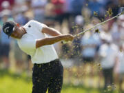 Xander Schauffele hits from the fairway on the 17th hole during the first round of the PGA Championship golf tournament at the Valhalla Golf Club, Thursday, May 16, 2024, in Louisville, Ky.