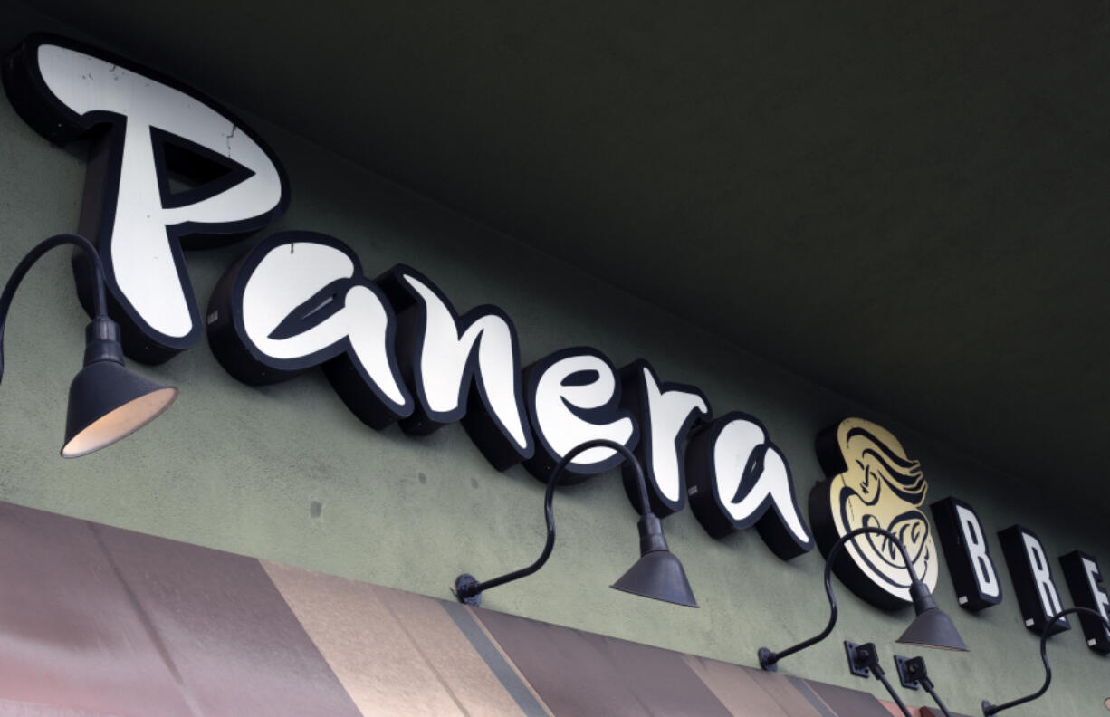 FILE - A Panera Bread sign and logo is attached to the outside of a Panera Bread restaurant location in the Studio City section of Los Angeles, on Thursday, March 7, 2024. Panera Bread said Tuesday, May 7, it&rsquo;s discontinuing its Charged Sips drinks that were tied to at least two wrongful death lawsuits due to their high caffeine content.
