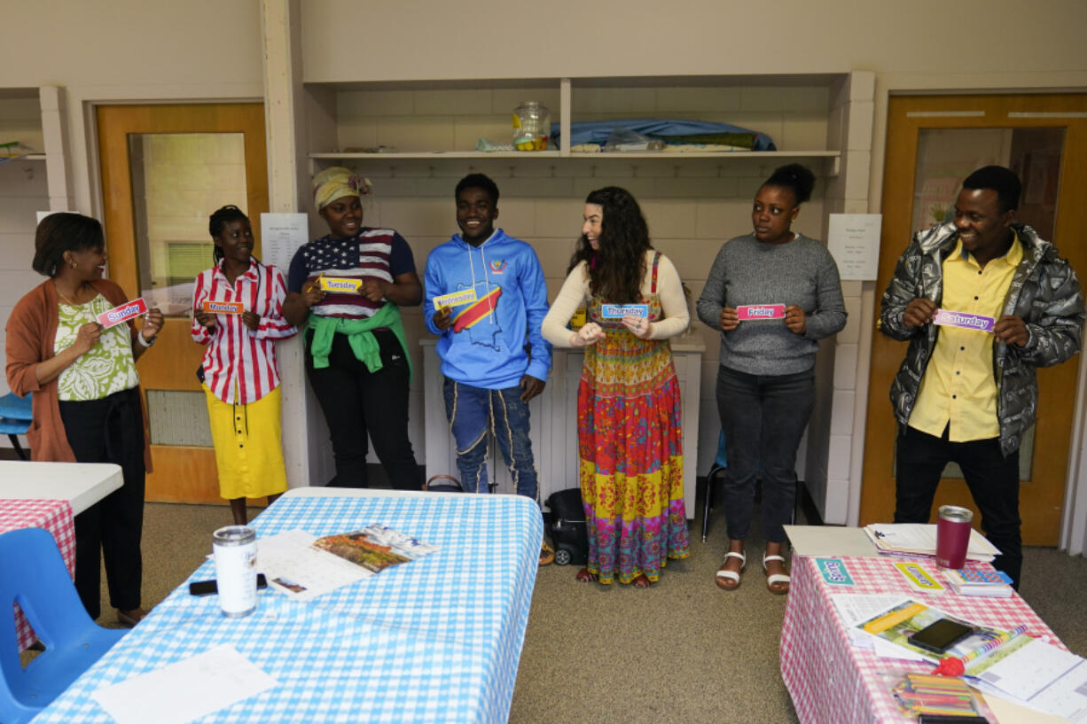 Refugees who recently arrived from Congo and Honduras participate in an English class, Thursday, April 11, 2024, in Columbia, S.C. The American refugee program, which long served as a haven for people fleeing violence around the world, is rebounding from years of dwindling arrivals under former President Donald Trump. The Biden administration has worked to restaff refugee resettlement agencies and streamline the process of vetting and placing people in America.