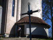 Christian Orthodox worshippers leave the chapel basement after attending a service at the Church of the Intercession of the Blessed Virgin Mary in, Lypivka, near Lviv, Ukraine, Sunday, April 28, 2024. This Orthodox Easter season, an extraordinary new church is bringing spiritual comfort to war-weary residents of the Ukrainian village of Lypivka. Two years ago it also provided physical refuge from horrors outside.