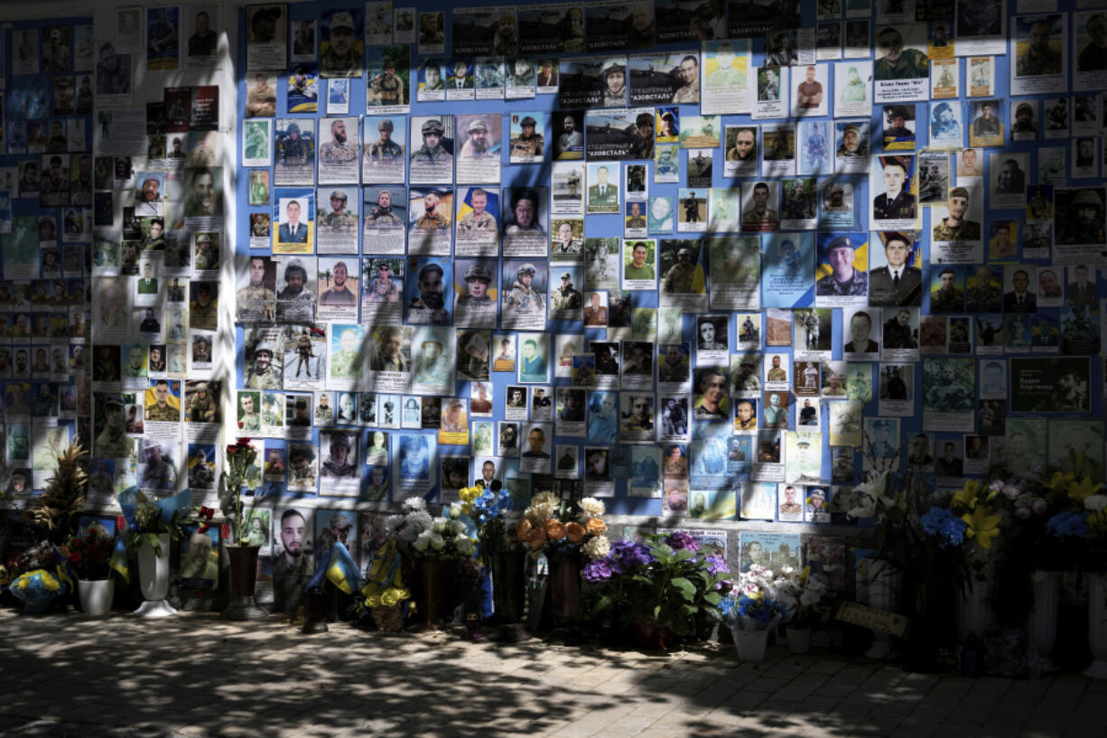 Flowers paying tribute to fallen soldiers adorn the Memory Wall of Fallen Defenders of Ukraine outside the Saint Michael&rsquo;s Golden Domed Monastery, during US Secretary of State Antony Blinken&rsquo;s visit, in Kyiv on Wednesday, May 15, 2024.