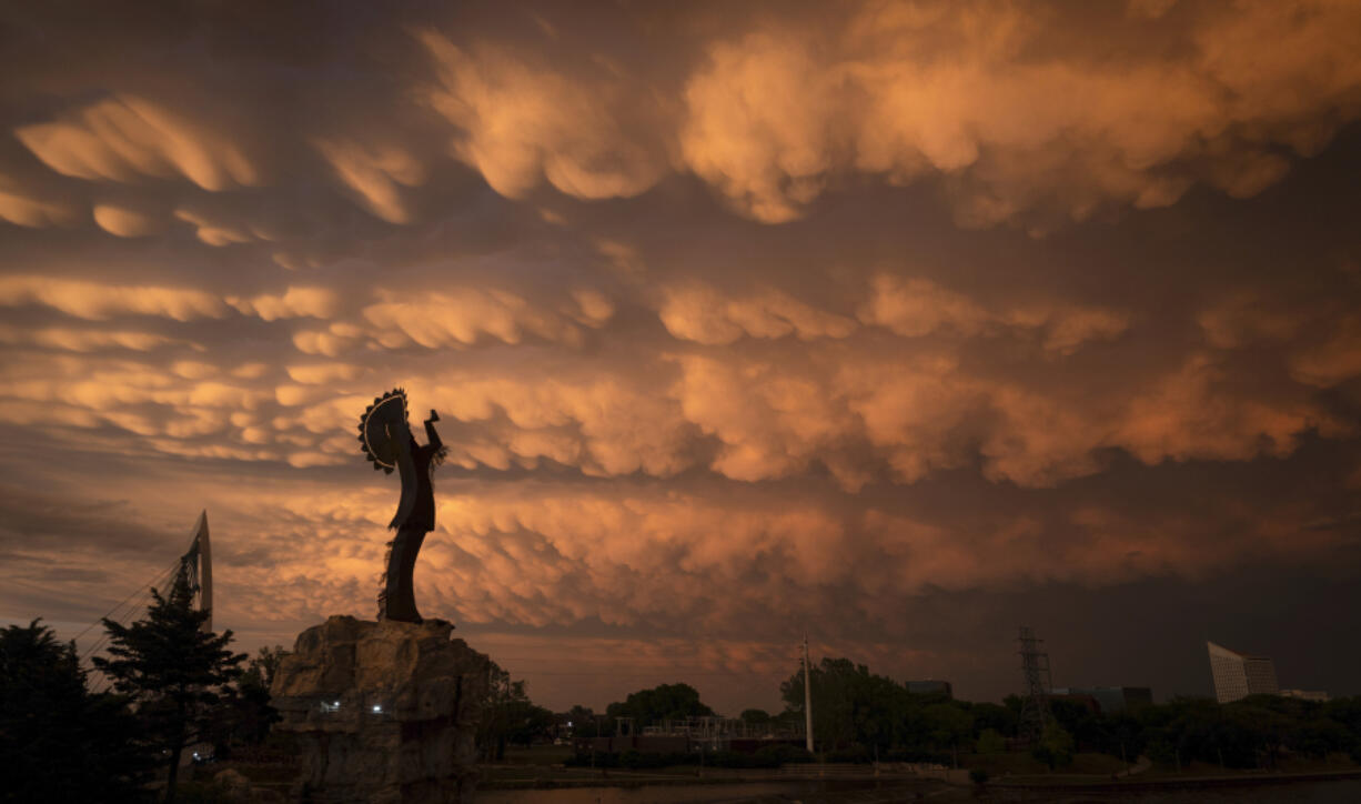 A formation of Mammatus clouds fills the sky over Wichita, Kan., on Tuesday, April 30, 2024. Mammatus clouds usually form on the back side of severe thunderstorms. A line of severe storms crossed the state Tuesday afternoon and evening, including a few tornados in the northeastern part of Kansas.