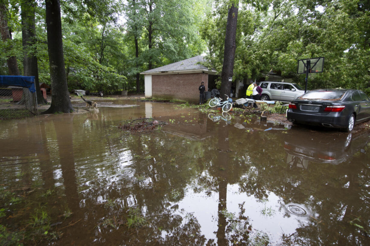 In addition to a tree from a neighbor&rsquo;s yard falling on their south Jackson, Miss., house, heavy rain caused flooding around the home of the Brown-Rankin family, May 13, 2024.