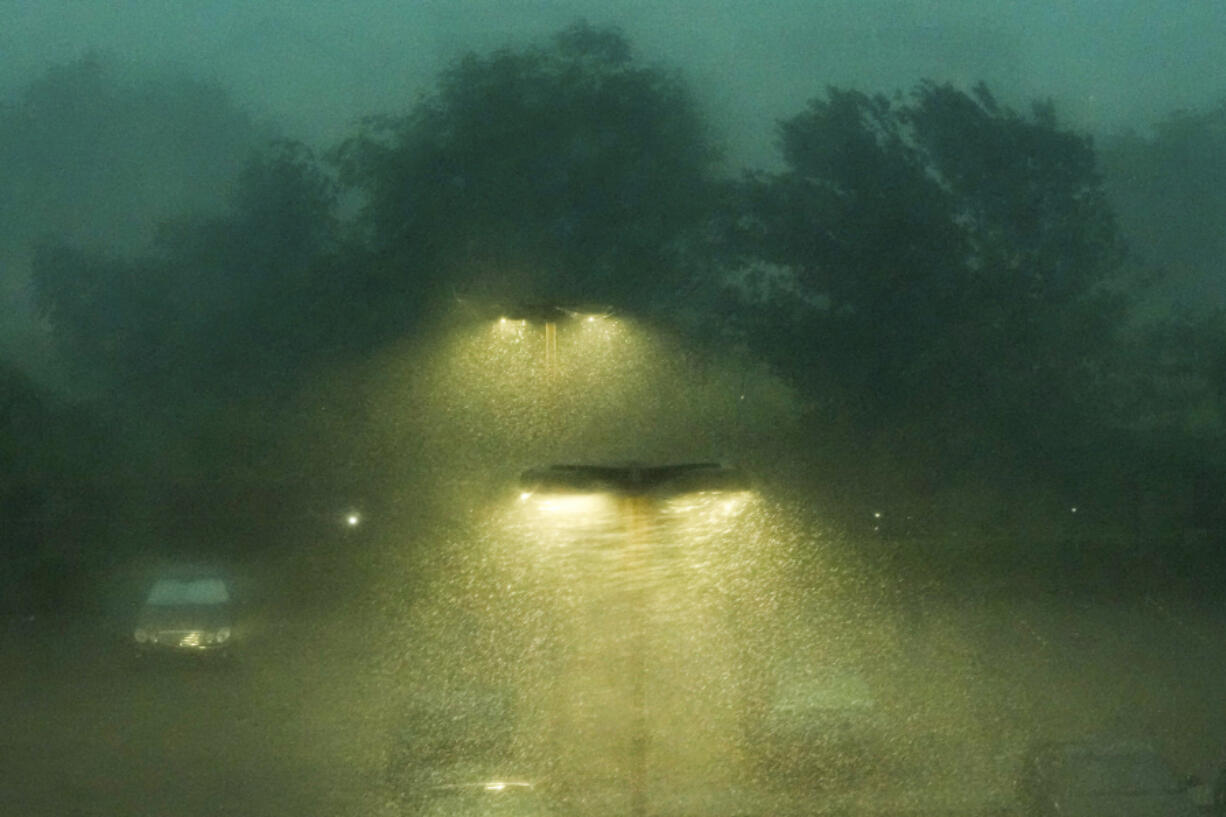 Rain falls as a storm rolls through Houston on Tuesday, May 28, 2024.