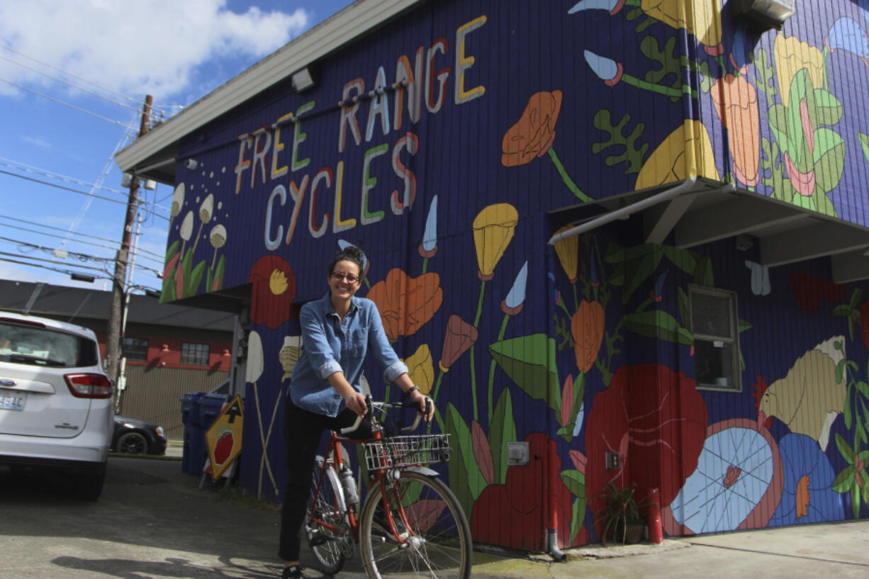 Shawna Williams, owner of Free Range Cycles, poses outside her shop on May 6, 2024, in Seattle, Wash. Williams didn&rsquo;t have the sales surge others did because her 700 square foot shop was so small she kept it open by appointment only from March 2020 to May 2021.