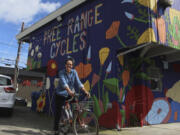 Shawna Williams, owner of Free Range Cycles, poses outside her shop on May 6, 2024, in Seattle, Wash. Williams didn&rsquo;t have the sales surge others did because her 700 square foot shop was so small she kept it open by appointment only from March 2020 to May 2021.