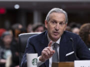 FILE - Starbucks founder and former CEO Howard Schultz testifies before the Senate Health, Education, Labor and Pensions Committee at the Capitol in Washington, Wednesday, March 29, 2023. In a LinkedIn post published over the weekend April 4, 2024, Schultz says the company&rsquo;s leaders should spend more time in stores and focus on coffee drinks as they work to turn around flagging sales. (AP Photo/J.