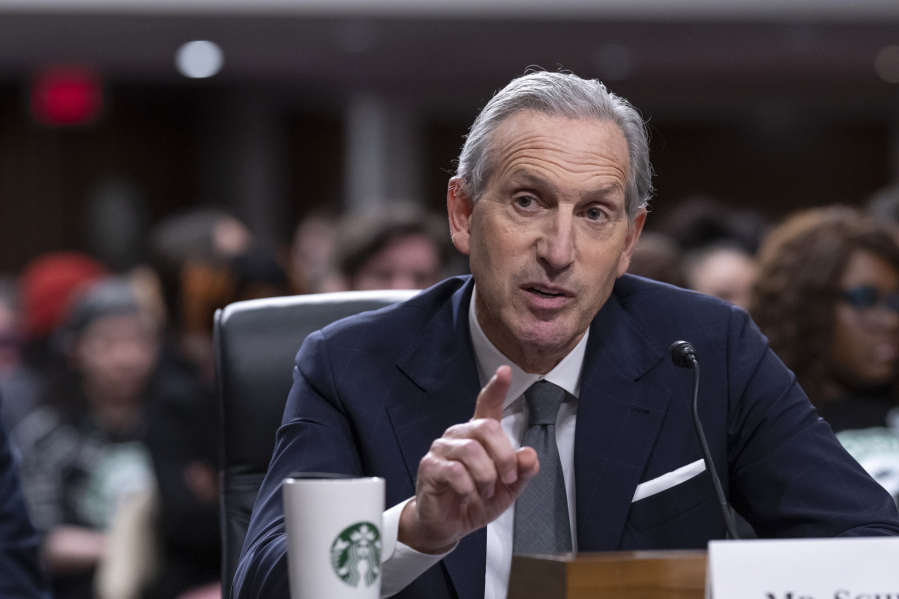 FILE - Starbucks founder and former CEO Howard Schultz testifies before the Senate Health, Education, Labor and Pensions Committee at the Capitol in Washington, Wednesday, March 29, 2023. In a LinkedIn post published over the weekend April 4, 2024, Schultz says the company&rsquo;s leaders should spend more time in stores and focus on coffee drinks as they work to turn around flagging sales. (AP Photo/J.