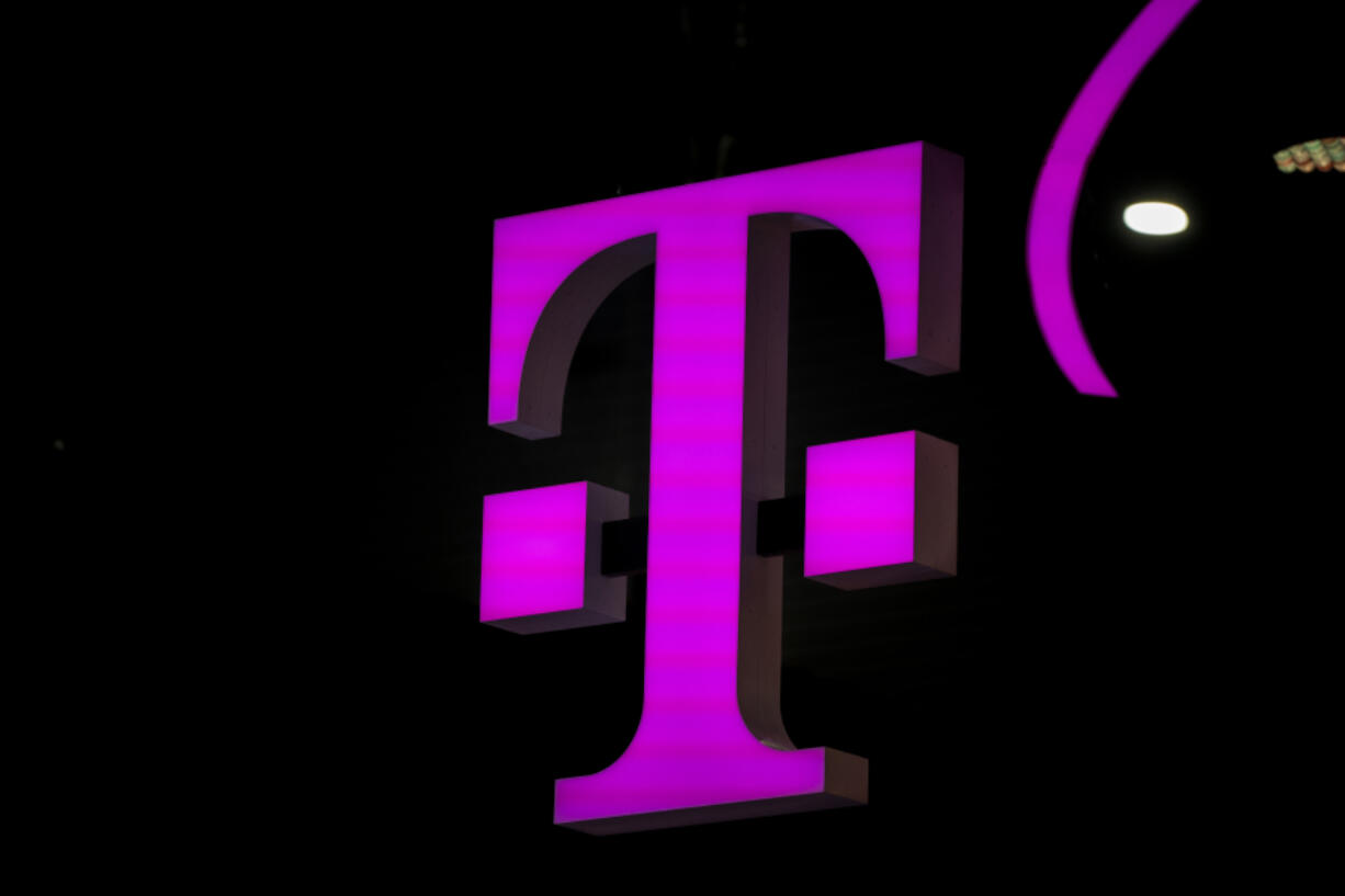 FILE - T-mobile logo in the Mobile World Congress 2023 in Barcelona, Spain, on Thursday, March 2, 2023. On Tuesday, May 28, 2024, T-Mobile is buying U.S. Cellular&rsquo;s wireless operations and certain spectrum assets in a deal valued at $4.4 billion.