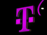 FILE - T-mobile logo in the Mobile World Congress 2023 in Barcelona, Spain, on Thursday, March 2, 2023. On Tuesday, May 28, 2024, T-Mobile is buying U.S. Cellular&rsquo;s wireless operations and certain spectrum assets in a deal valued at $4.4 billion.