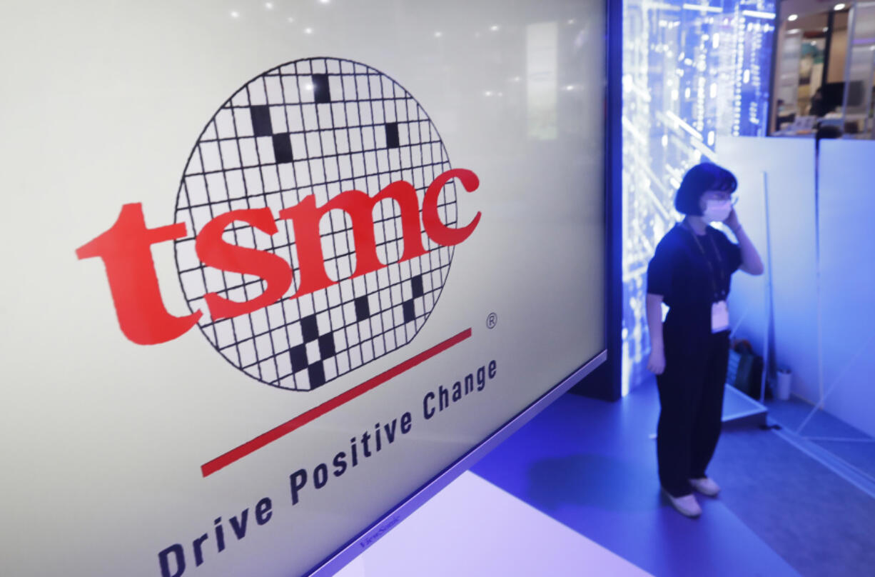 FILE - This photo shows the logo of TSMC (Taiwan Semiconductor Manufacturing Company) during the Taiwan Innotech Expo at the World Trade Center in Taipei, Taiwan, Oct. 14, 2022. Taiwan is reducing its reliance on the Chinese mainland as it seeks to insulate itself from pressure from Beijing while forging closer economic and trade ties with the United States.