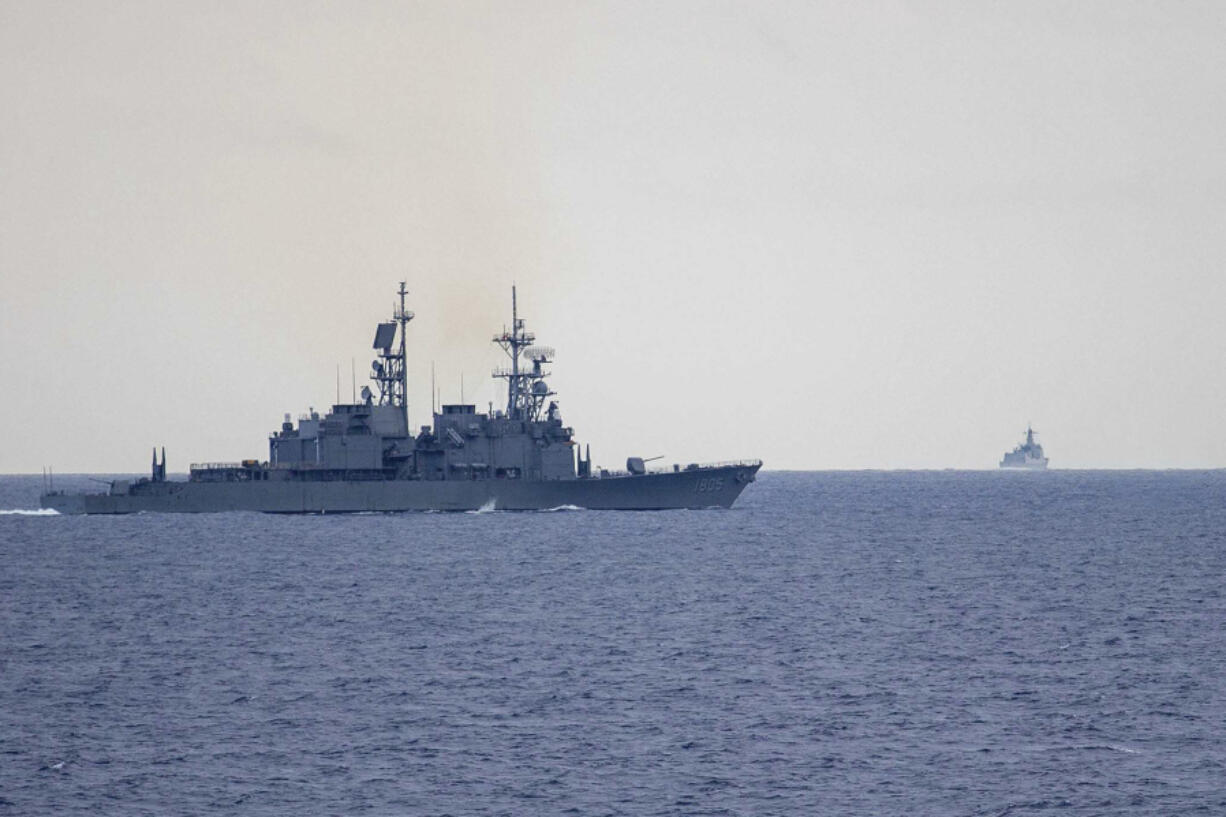 In this photo released by the Taiwan Ministry of National Defense, Taiwan guided missile destroyer Ma Kong DDG1805, left, monitors Chinese guided missile destroyer Xi&rsquo;an DDG15,  right, near Taiwan on Thursday, May 23, 2024. Taiwan tracked dozens of Chinese warplanes and navy vessels off its coast Friday on the second day of a large exercise China&rsquo;s People&rsquo;s Liberation Army held in response to the inauguration of the island&rsquo;s new leadership.