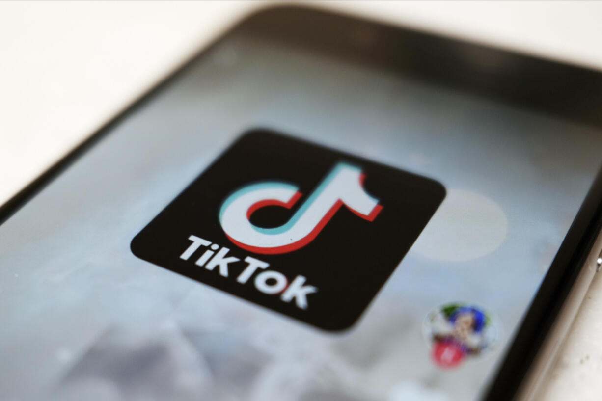 FILE - The TikTok logo is displayed on a smartphone screen in Tokyo on Sept. 28, 2020. TikTok says it&rsquo;s going to start automatically labeling content that&rsquo;s made by artificial intelligence when it&rsquo;s uploaded from certain platforms. TikTok says its efforts are an attempt to combat misinformation from being spread on its social media platform. The announcement came on ABC&rsquo;s &ldquo;Good Morning America&rdquo; on Thursday, May 9, 2024.