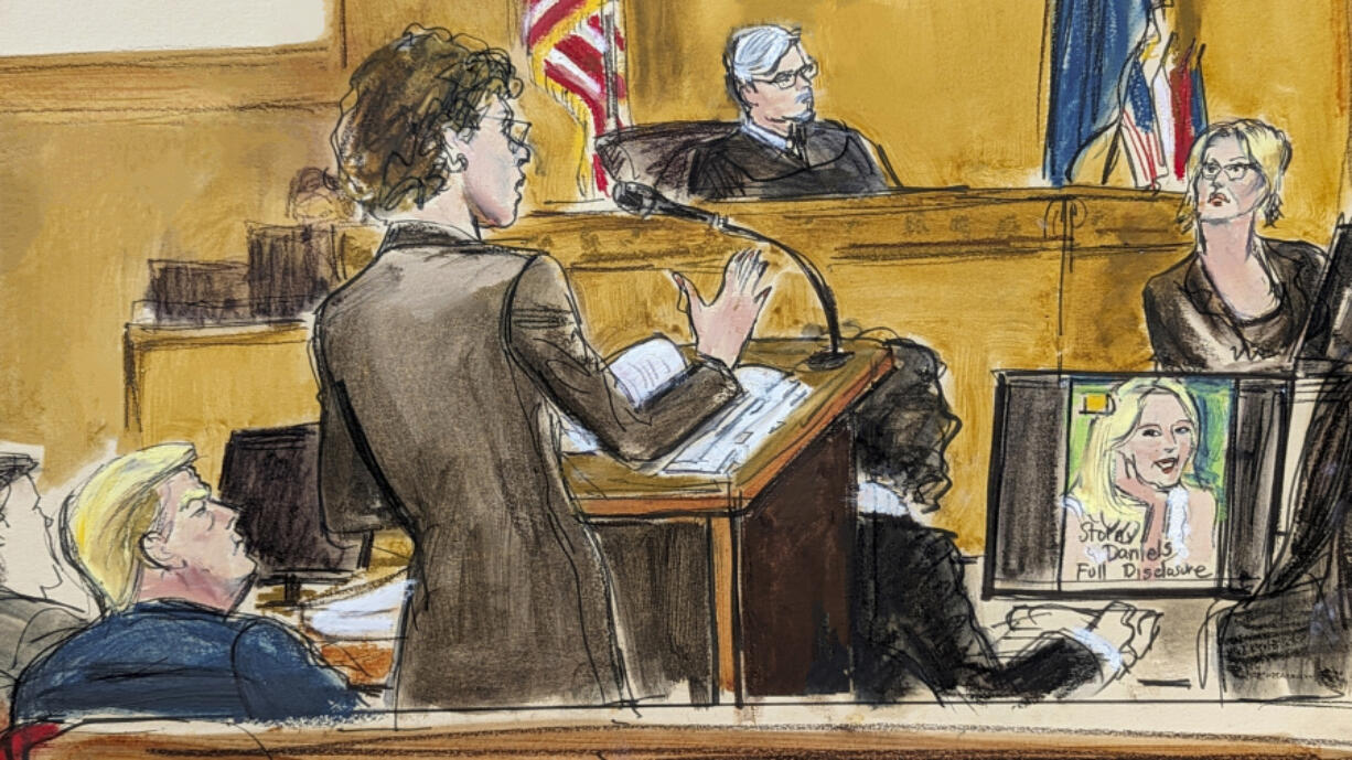 In this courtroom sketch, defense attorney Susan Necheles, center, cross examines Stormy Daniels, far right, whose real name is Stephanie Clifford, as former President Donald Trump, left, looks on with Judge Juan Merchan presiding during Trump&rsquo;s trial in Manhattan criminal court, Tuesday, May 7, 2024, in New York.