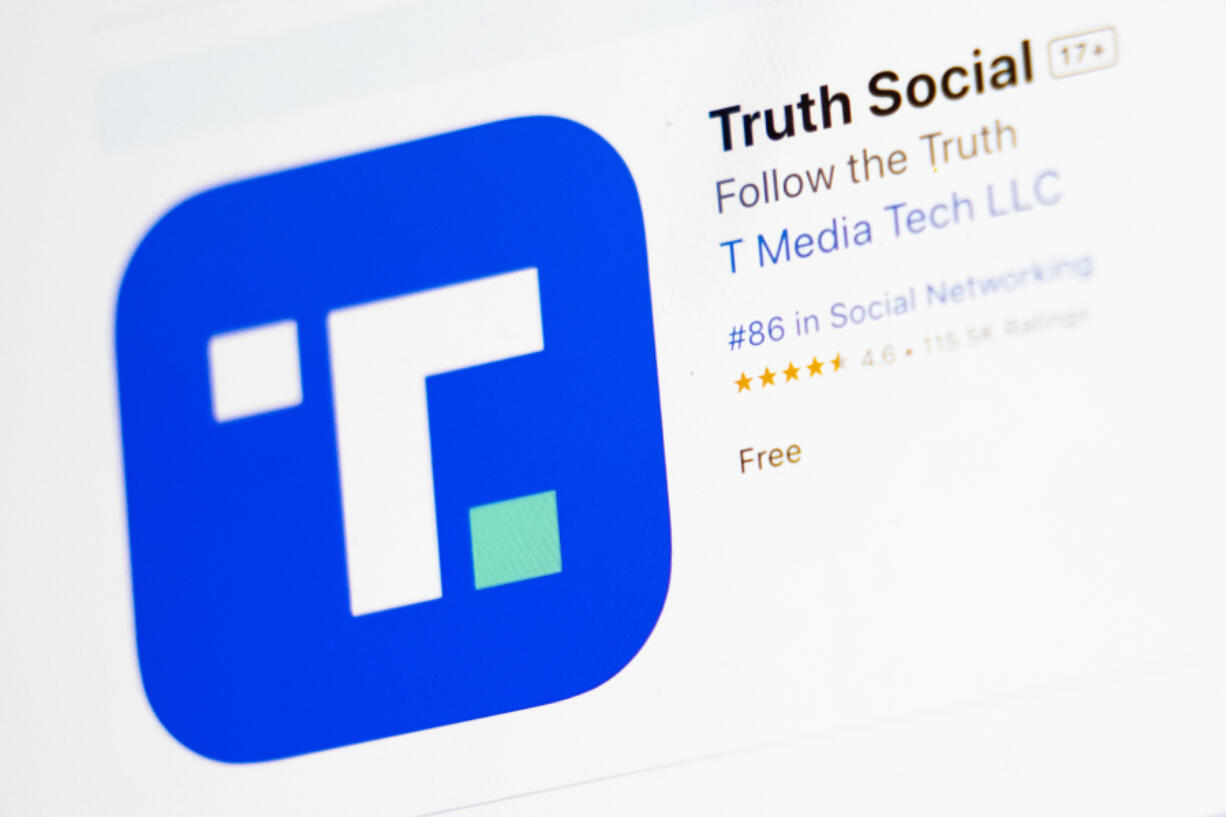 FILE - The download screen for Truth Social app is seen on a laptop computer, March 20, 2024, in New York. Trump Media and Technology Group, the owner of former President Donald Trump&rsquo;s social networking site Truth Social, lost more than $300 million last quarter, according to its first earnings report as a publicly traded company Monday, May 20.